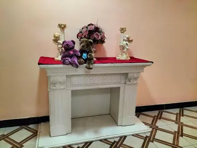 two teddy bears sitting on top of a table at พีเพลส in Bangkok