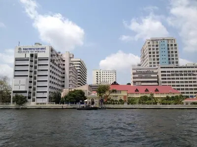 a view of a city from a river with buildings at 24Residence Siriraj in Bangkok