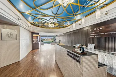 a lobby with a blue and gold ceiling at Town in Town Hotel Bangkok in Bangkok