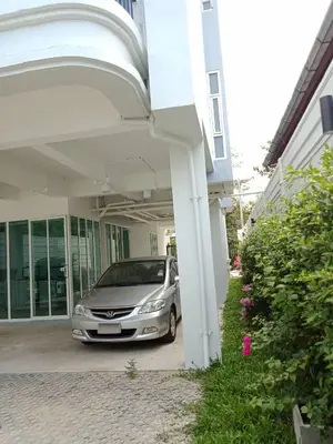 a silver car parked inside of a house at TEAK VILLA in Bangna