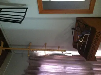 a set of stairs in a room with a window at White Orchid Inn I in Bangkok