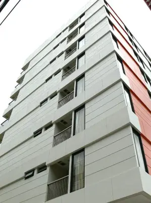 a tall building with balconies on the side of it at Tango Vibrant Living Hotel - SHA Extra Plus in Bangkok