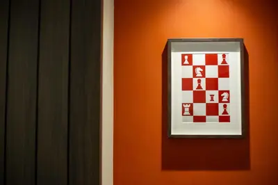 a picture of a chess board on a wall at Lemontea Hotel Bangkok in Bangkok