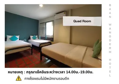a room with two beds and a sign that reads quiet room at Baan Wangderm Hotel in Bangkok
