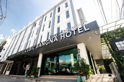 a building with a sign on the front of it at Cubic Bangna in Bangkok
