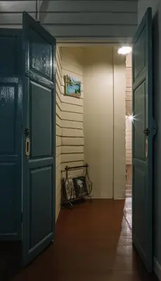 an open door in a room with a hallway at Lhong Yaowarat hostel in Bangkok
