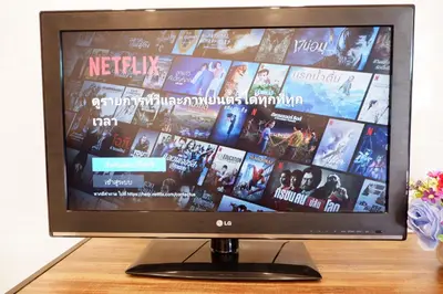 a television screen with a bunch of movies on it at Lisa'House in Bangkok