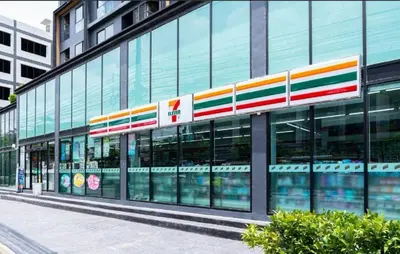 a building with a sign on the side of it at The Excel Groove Condo at Lasalle 52 in Bangkok