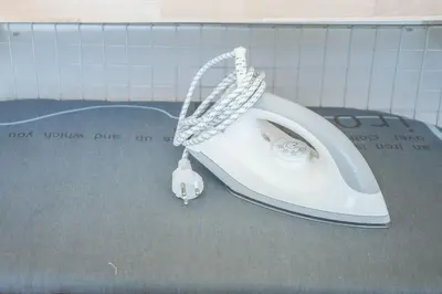 a white computer mouse sitting on top of a table at U1 Large 2 bed rooms BTS Udomsuk in Bangkok