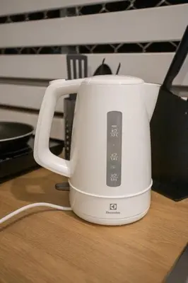a white toaster sitting on top of a table at B3 Cosy Studio /5 guests/ Near MRT/full kitchen in Bangkok