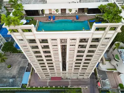an overhead view of a building with a pool at Grand Asoke Suites Boutique Residence in Bangkok