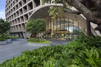 a rendering of a building with trees and plants at Sindhorn Kempinski Hotel Bangkok in Bangkok