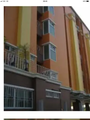 a building with balconies on the side of it at BM Mansion in Bangna