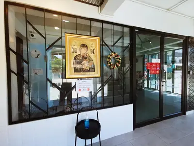 a display case in a building with a picture on the wall at Star Sukhumvit in Bangkok