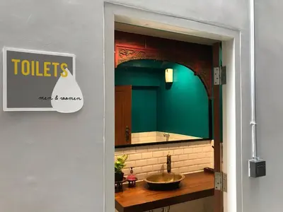 a bathroom with a sink and a mirror at S1hostel Bangkok in Bangkok