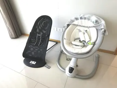 a black and white hair dryer next to a hair vacuum at North Park Serviced Apartment Bangkok in Bangkok