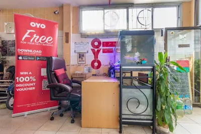 a store with two free signs in a room at OYO 583 Sweethome Guest House in Bangkok Noi