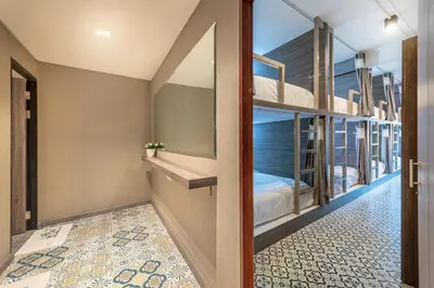 a guest room with a view of the ocean at Happy Station Bangkok in Bangkok