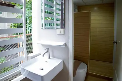 a bathroom with a sink and a toilet at ปลื้มจิต อพาร์ทเม้น บางใหญ่ in Nonthaburi