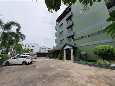 a car parked in front of a building at Million Mansion in Bangkok