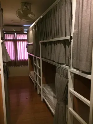 a room with two bunk beds in a room at VX The Fifty in Bangkok