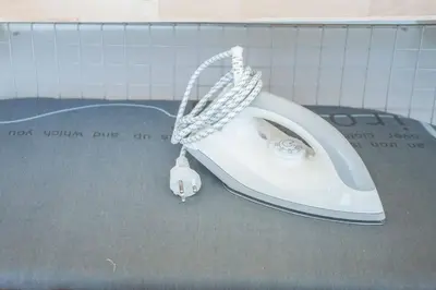 a white computer mouse sitting on top of a table at S3 Silom26 · S3 Silom central, large room, full kitchen, WIFI, in Bangkok