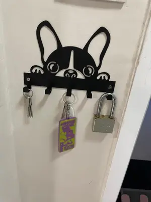 a door hanger with a cat face and keys at M Villa @ Impact Muangthongthani in Ban Bang Phang