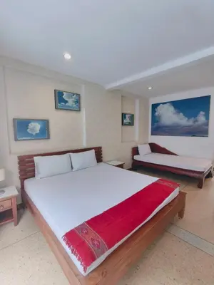 a bedroom with two beds in a room at Cloud no 3 Serene Oasis King Bed in BKK Heart in Bangkok