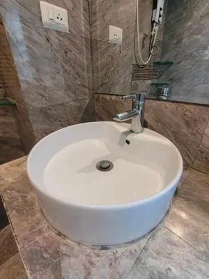 a white sink in a bathroom with a shower at Cloud no 3 Serene Oasis King Bed in BKK Heart in Bangkok