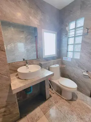 a bathroom with a sink and a toilet at Cloud no 4 Green n Quiet Heart BKK With a Balcony in Bangkok