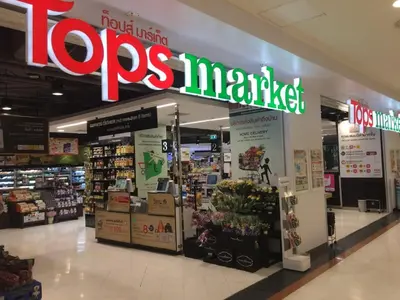 a store with aopes pharmacy sign in a store at The Quarter Ploenchit by UHG in Bangkok