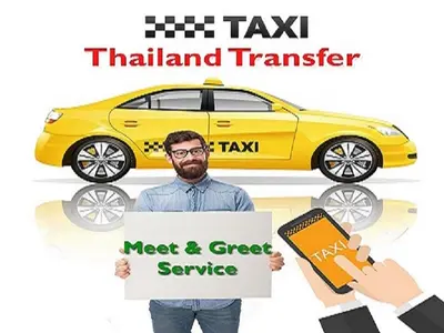 a man holding a sign in front of a yellow car at Comfortable studio T8 Impact Bangkok Thailand in Nonthaburi