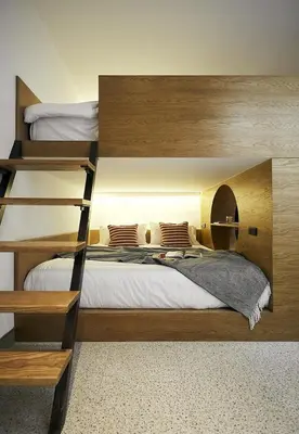 a bedroom with two bunk beds and a bed at B House 49 Bangkok in Bangkok