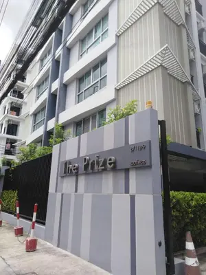 a sign for the pike in front of a building at THE PRIZE in Ban Yang