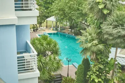 a view of a swimming pool from a building at Bellevue Boutique Bangkok in Amphoe Phra Khanong
