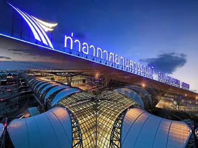 a view of a stadium at night at Airport Transfer Bangkok apartment in Thung Si Kan