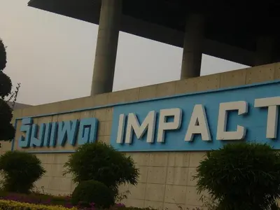 a large sign on the side of a building at Asia Don Mueang Bangkok Condominium in Thung Si Kan