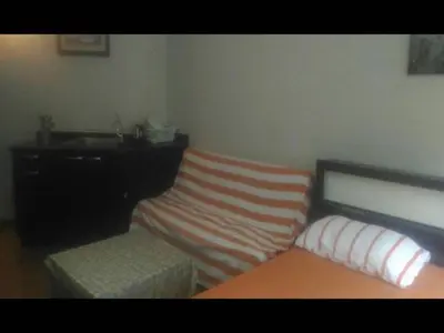 a bedroom with a bed and a desk and a bench at Dmk Don Mueang airport Guest House meet-greet service in Thung Si Kan
