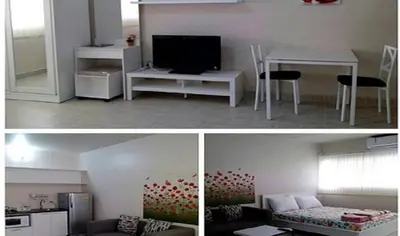 two pictures of a living room and a kitchen at Impact Don Mueang Bangkok Guest House in Thung Si Kan