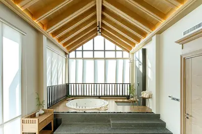 a large room with a large window and a tub at W1Bangkoknoi Hotel in Nonthaburi