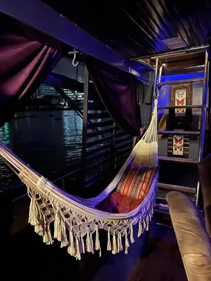 a hammock on the back of a boat at Sabai Sabai Liveaboard Bangkok in Bangkok