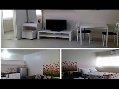 two pictures of a living room and a living room with a television at T8 Guest House Don Mueang Challenger, Located in Bangkok in Ban Song Hong