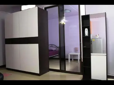 a room with a sliding glass door with a refrigerator at Popular Palace in Don Mueang Bangkok in Ban Bang Phang