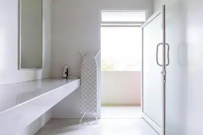 a bathroom with a sink and a mirror at Siamaze Hostel in Bangkok