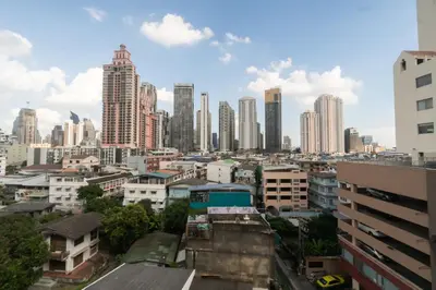 a view of a city with tall buildings at Spark Hotel - MRT Queen Sirikit - SHA Extra Plus Certified in Bangkok