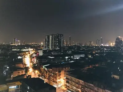 a view of a city at night with buildings at \u6eab\u99a8\u5c0f\u5c4b in Bangkok