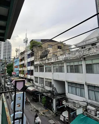 an overhead view of a city street with buildings at Baan Glang Soi Restaurant & Guesthouse in Bangkok