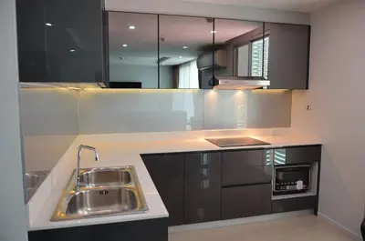 a kitchen with a sink and a counter top at ViVi Avenue Thonglor in Bangkok