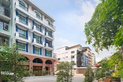a group of buildings on a city street at Ago Hotel Chinatown in Bangkok