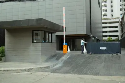 a man on a skateboard in front of a building at Sukhumvit 11#Luxury#Pool#Gym#BTS Nana&MRT Sukhumvit#1BR#Max2ppl in Bangkok